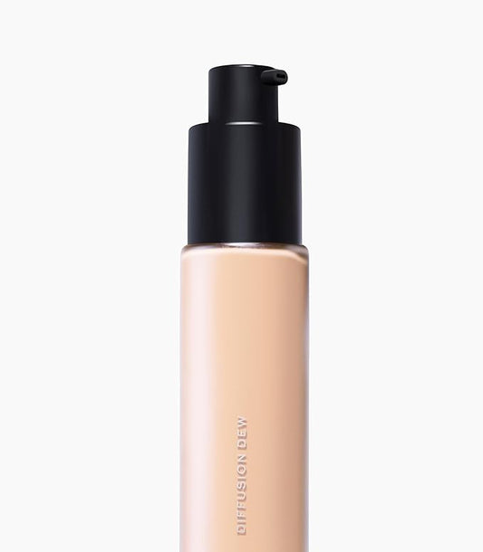 MAKE Beauty Diffusion Dew Skin Tint. Sheer to Medium Coverage Radiant Finish. Blurring, Smoothing, and Brightening. Enhanced with Niacinamide and Adenosine. Diffusion Dew - Light 01.5